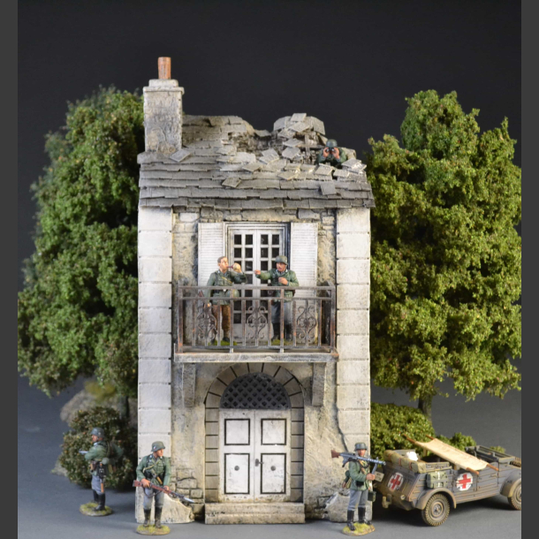 French Normandy house with bomb roof and balcony