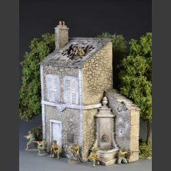 French Normandy house with a bomb roof and fountain