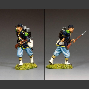 Infantryman reaches for a cartridge
