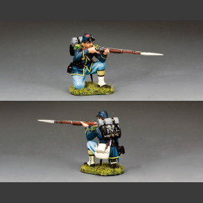 Kneeling infantryman firing rifle