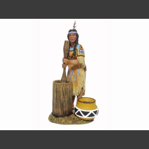 Woman mashing corn w/mallet