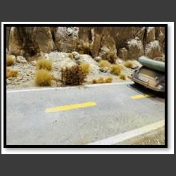 Asphalt road through desert - diorama