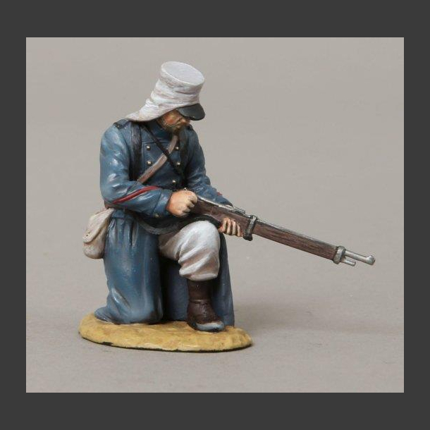 French Foreign Legionnaire - rifleman, kneeling loading his rifle
