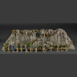 Rocky mountain with withered grass tops and green bushes
