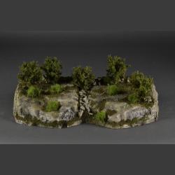 Cliff with green grass tops and green bushes
