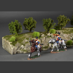 Cliff with green grass tops and green bushes