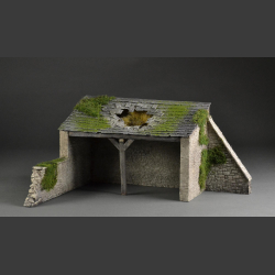 Old barn building with a hole in the roof...