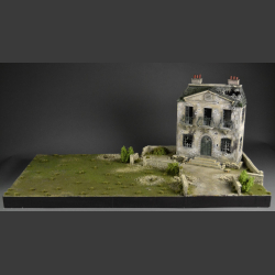 Manor house in shot and bombed condition with a large lawn - Diorama