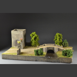 Medieval tower and bridge over river