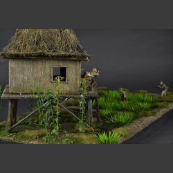 Jungle hut surrounded by rice fields - diorama