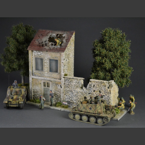 French country house and stone wall