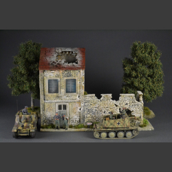 French country house and stone wall