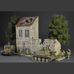 French country house and stone wall