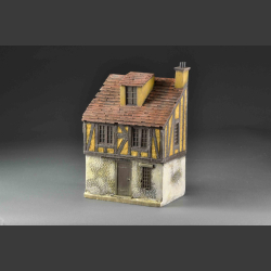 Yellow medieval house on 3 floors