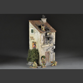 Italian bombed house with balcony and plant pots