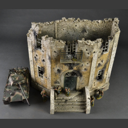 Facade of a bombed and shelled large Nazi building. 