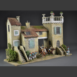 French monastery with tower-building and passage.