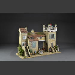 French monastery with tower-building and passage.
