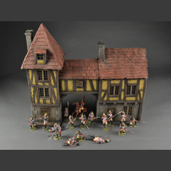 Half-timbered house or medieval house with passage and tower building.