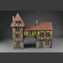Half-timbered house or medieval house with passage and tower building.