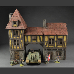 Half-timbered house or medieval house with passage and tower building.