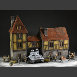 Medieval building with passage and tower building.