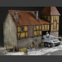Medieval building with passage and tower building.