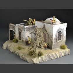 North African Mosque with passage on rocky ground