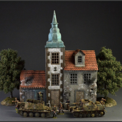 European city with spires and cobblestone street - Diorama