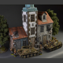 European city with spires and cobblestone street - Diorama
