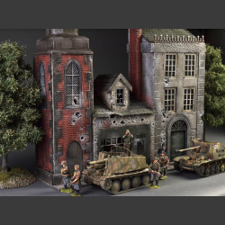 European city with spires and cobblestone street - Diorama