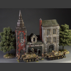European city with spires and cobblestone street - Diorama