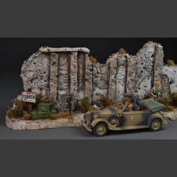Tobruk - North African stone wall with dry bushes and grass
