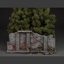 Bombed and shot brick wall