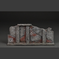 Bombed and shot brick wall