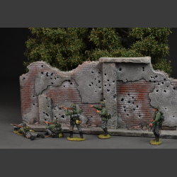 Bombed and shot brick wall